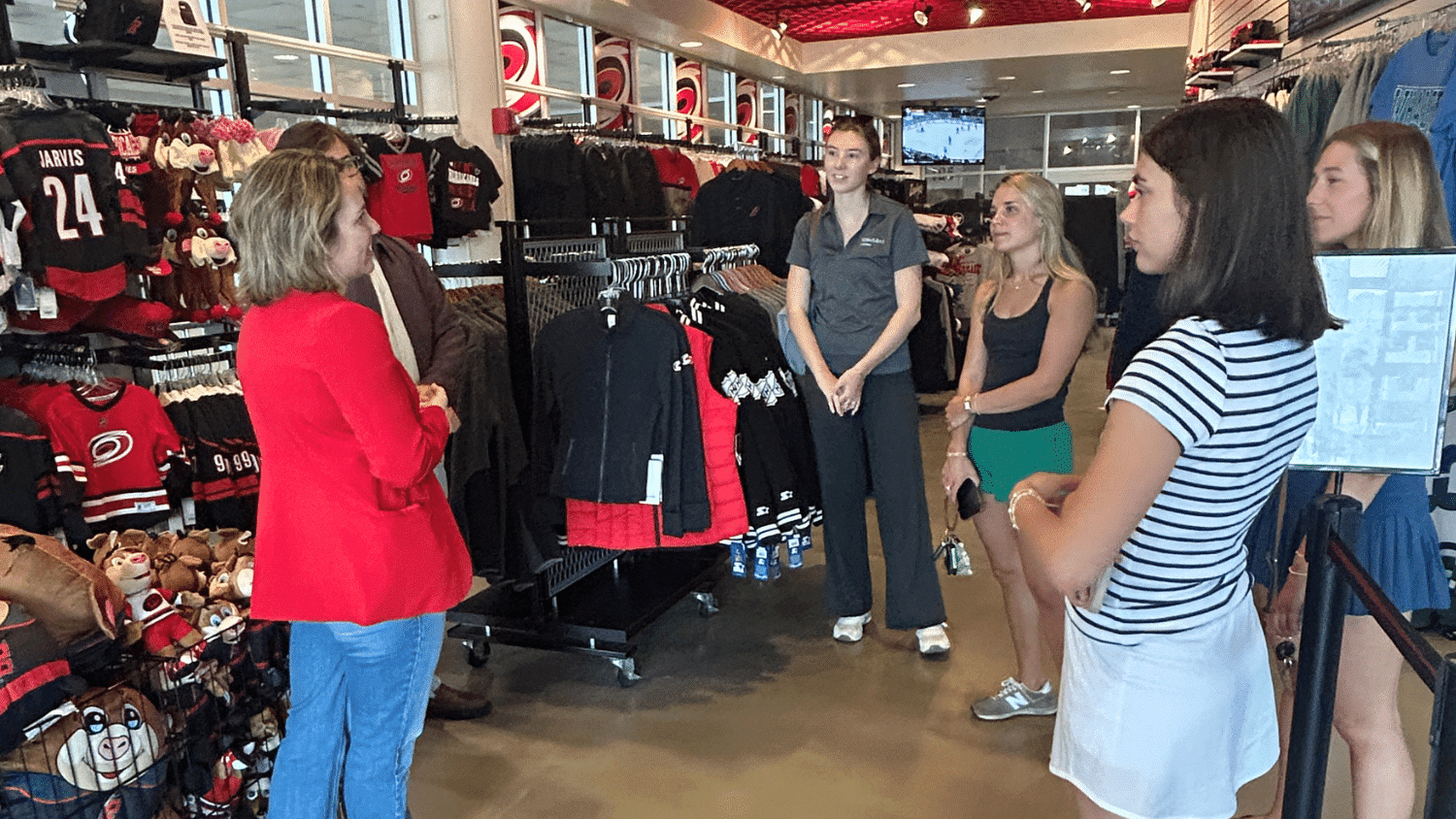 NC State students tour the Carolina Hurricanes store inside the Lenovo Center.