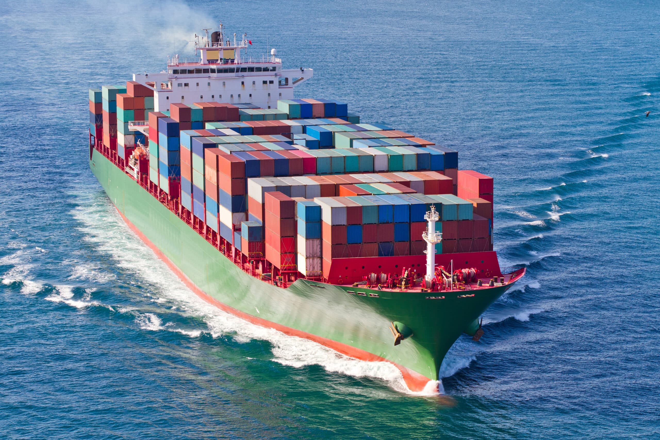 Fully loaded container ship sailing the ocean