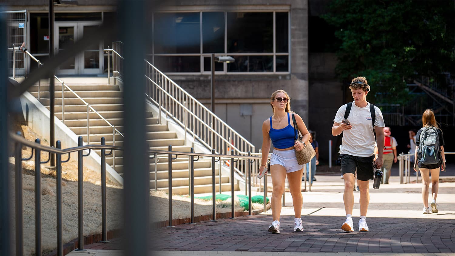 Students walk across the Brickyard